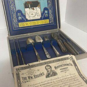 USED ..  tarnished AND  needs cleaned. Collector's box is worn due to age